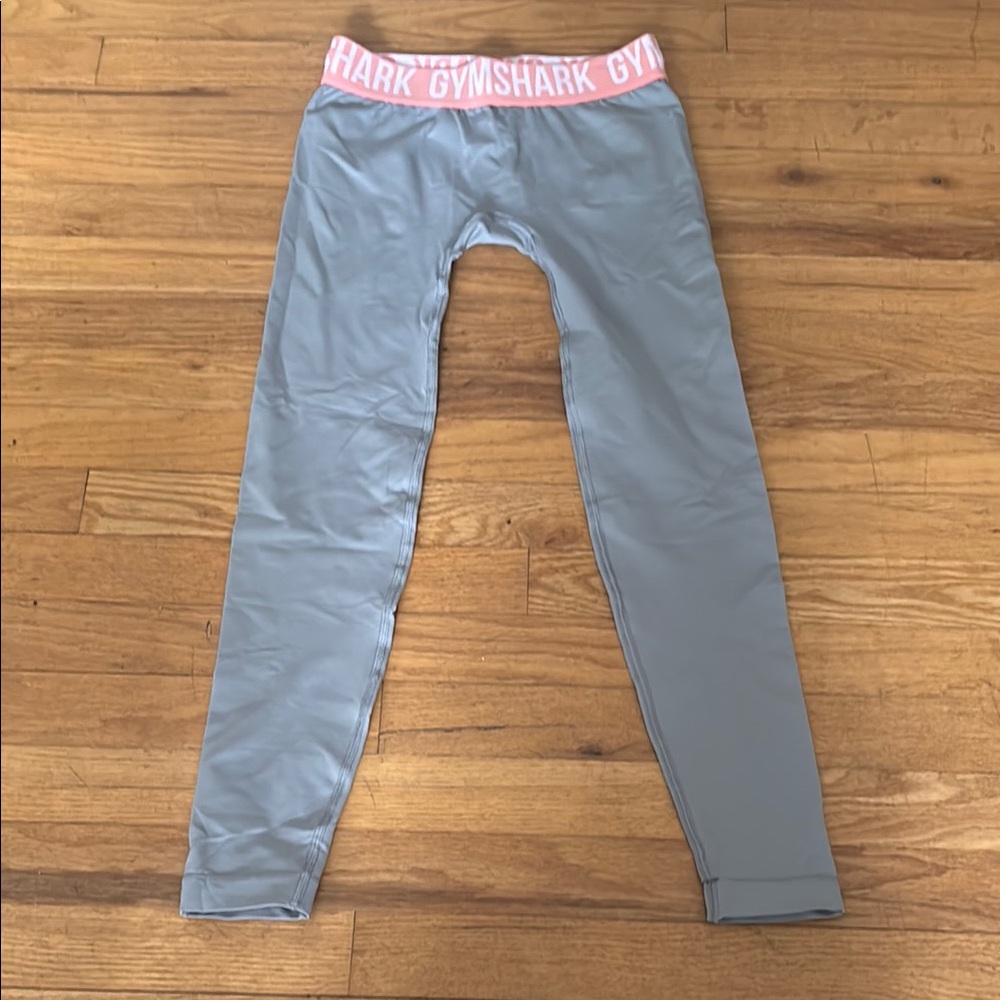 Gym shark size small grey leggings with pink band. Perfect condition. Worn once.